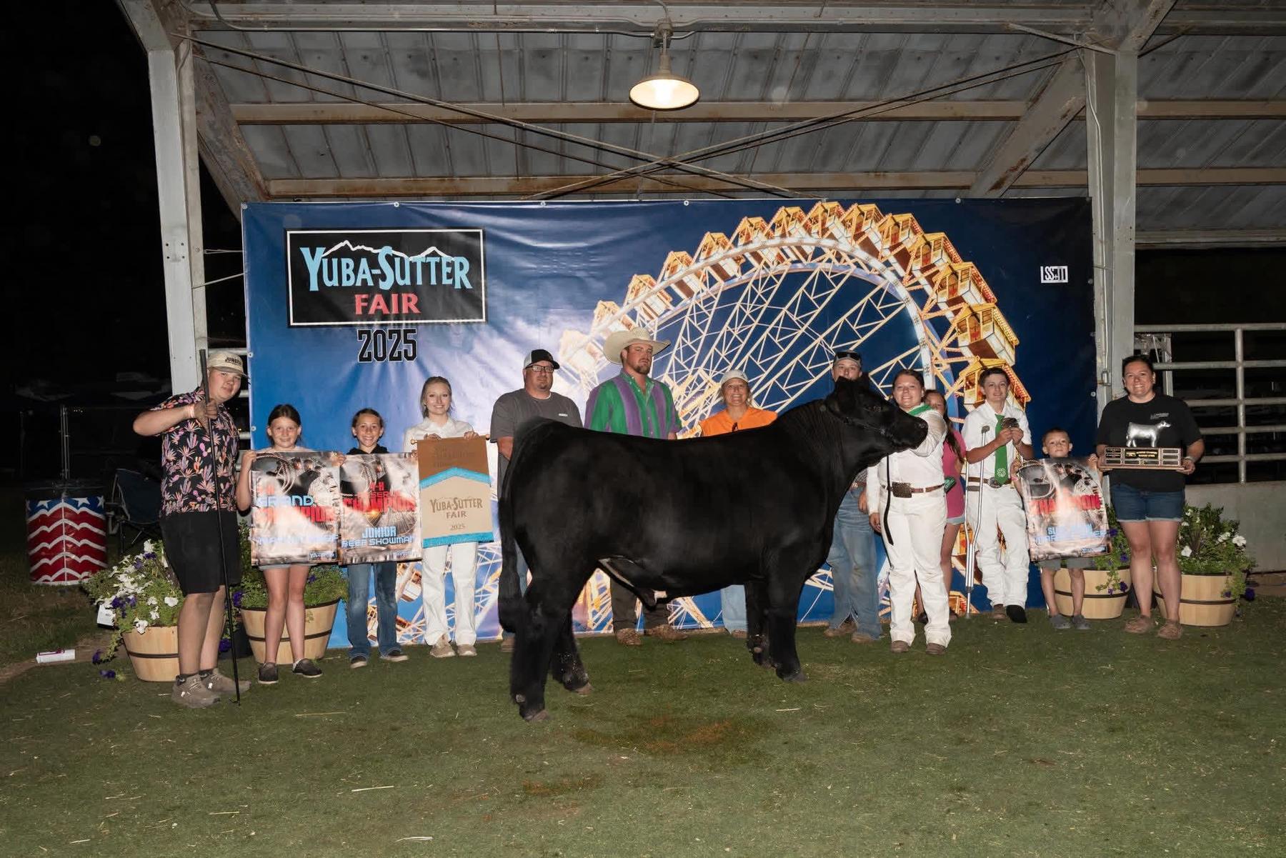 Bailee Trujillo with the grand champion at the 2025 Yuba-Sutter Fair
